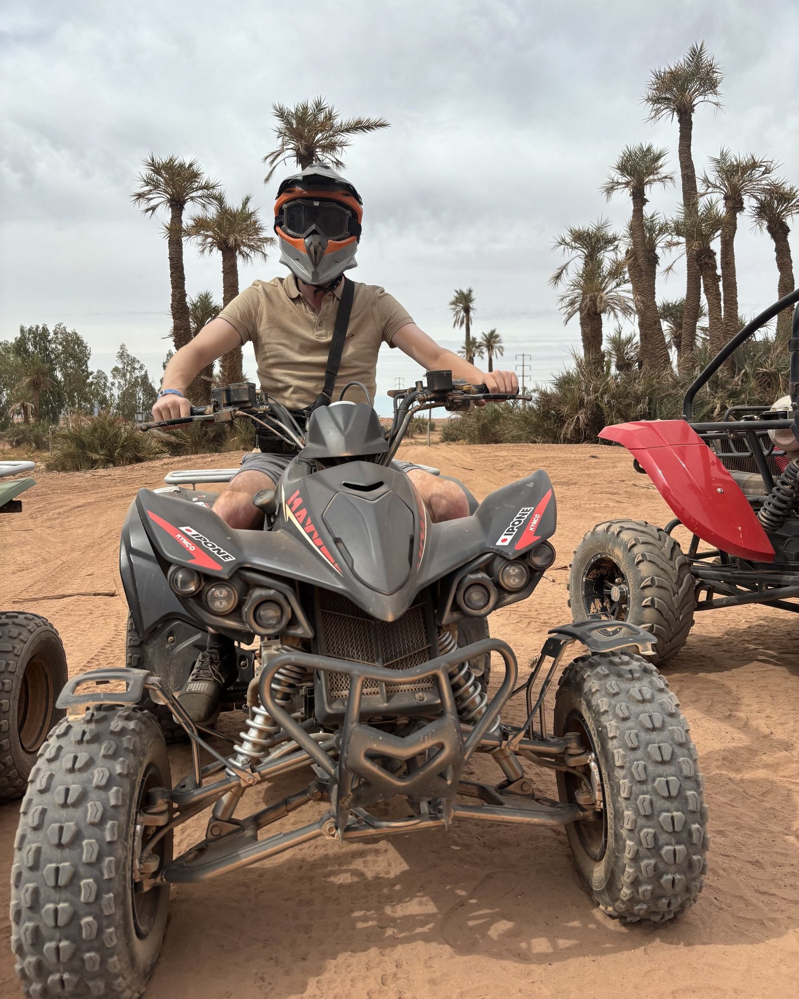 Brandon on a quad bike in the Agafay desert, Marrakech